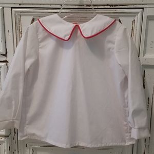Long sleeve white w/red trim dress shirt.